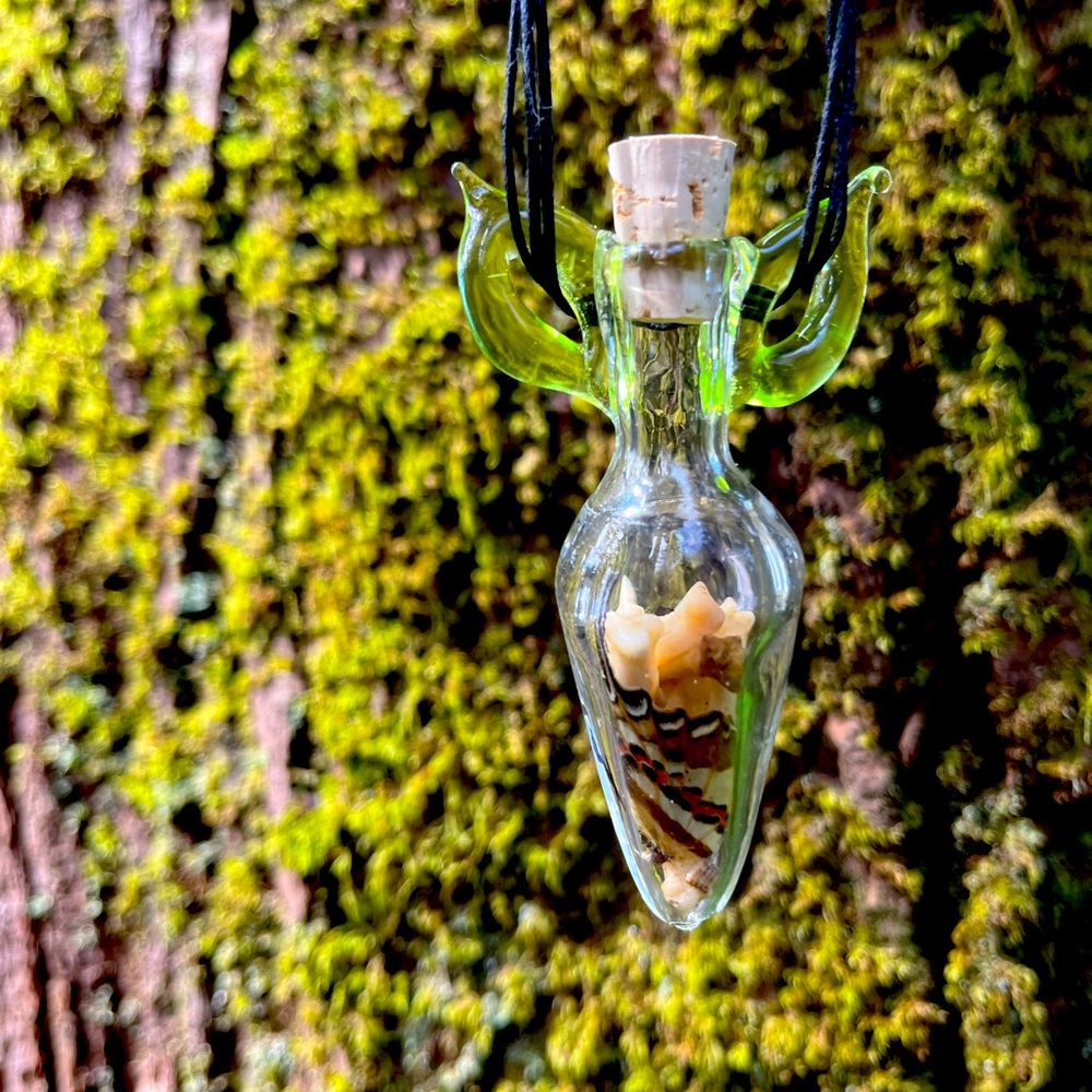 Vulture vial pendant